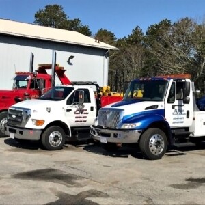 A fleet of tow trucks